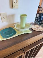 Group shot showing all four ceramic items on credenza