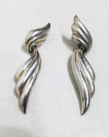 front view of both earrings showing design