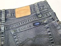 Rear waistband showing Freego patch and pocket detail