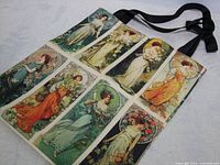 Front of tote bag showing full printed design and handles