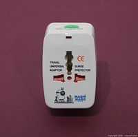 Front view showing universal socket, surge protector label, CE mark, MashiMaro logo