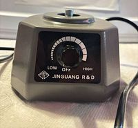 Front view showing brand panel, intensity dial and power cord