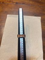 Stainless-tone ring with wood look inlay on mandrel