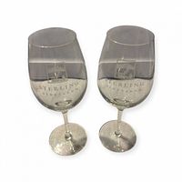 Front view of both etched crystal wine glasses