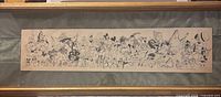 Full view of framed panoramic Disney character line art print