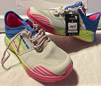 Shoes side and top view with tags attached