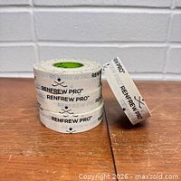 Stack of Renfrew Pro tape rolls showing branding and width