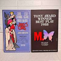 Both posters side by side