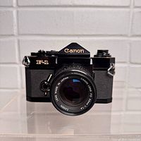 Front view of Canon F-1 with FD 50mm lens attached