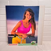 Front of Fujicolor display sign showing image and logo