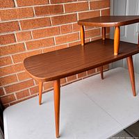 full view of two-tier side table front and top surfaces