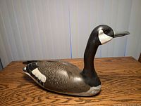 Side profile of carved Canada goose