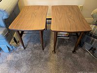 Two identical rectangular side tables side by side