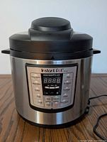 Front view showing control panel and exterior condition