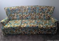 Front view of three-seat floral sofa