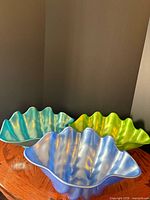 All three shell bowls grouped showing colors and shape