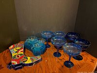 Entire lot showing snack set, boot decor, margarita glasses