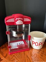 Full view of West Bend popcorn machine and ceramic bowl