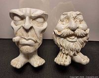 Front view of both ceramic face planters