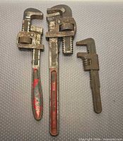 Front view showing three wrenches side by side