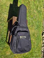 Full view of Martin & Co gig bag front with pocket and logo visible
