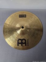 Front view of Meinl HCS 10" splash cymbal showing lathed surface and logos