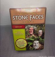 Front of sealed Poetry Stones Stone Faces Kit box