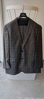 Front view of grey Brooks Brothers Madison jacket on hanger