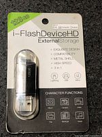 Front of sealed retail package showing drive and 128GB marking