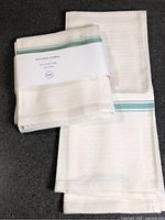 Front view of packaged towel set