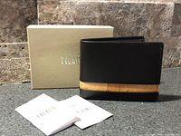 Wallet front with box and papers