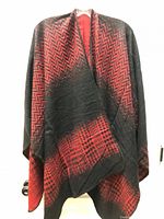 Front view of reversible poncho scarf showing red/black chevron fade