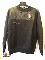 Front view showing leather yoke, tag, and front embroidery