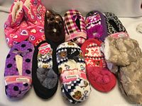 Overview of all ten pairs of assorted slippers