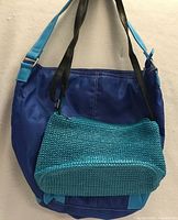 Both bags hanging to show relative sizes and colors