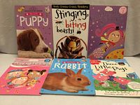 All six books front covers visible