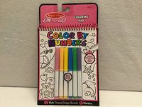 Front view of sealed Melissa & Doug Color By Numbers Coloring Pad showing included six markers