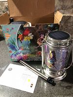 Box with two solar lantern stakes components visible