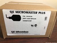 Factory box showing product label with brand, model, part number