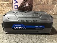 Battery showing top and front labels