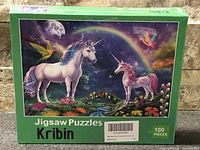 Front of sealed Kribin 100-piece unicorn jigsaw puzzle box