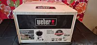 Front of sealed Weber Original Kettle 22" grill box showing model, size, warranty