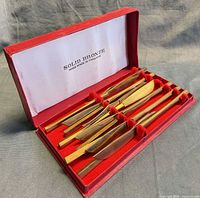 closed shot of knives in presentation box showing Solid Bronze branding
