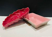 Leaf shaped and rectangular dishes angled to show shape and glaze