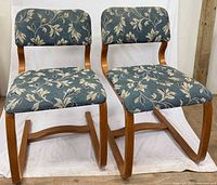 Pair of matching Magnus Olesen armchairs front view