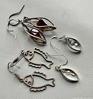 All three pairs of sterling silver earrings displayed