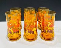 Six amber Libbey Autumn Leaves tumblers front view