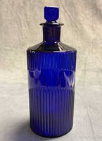 Front view showing full bottle and ribbed texture