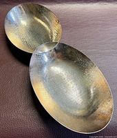 Top view showing full double-oval hammered silver-plated bowl