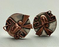 Front view showing design and mixed metal contrast